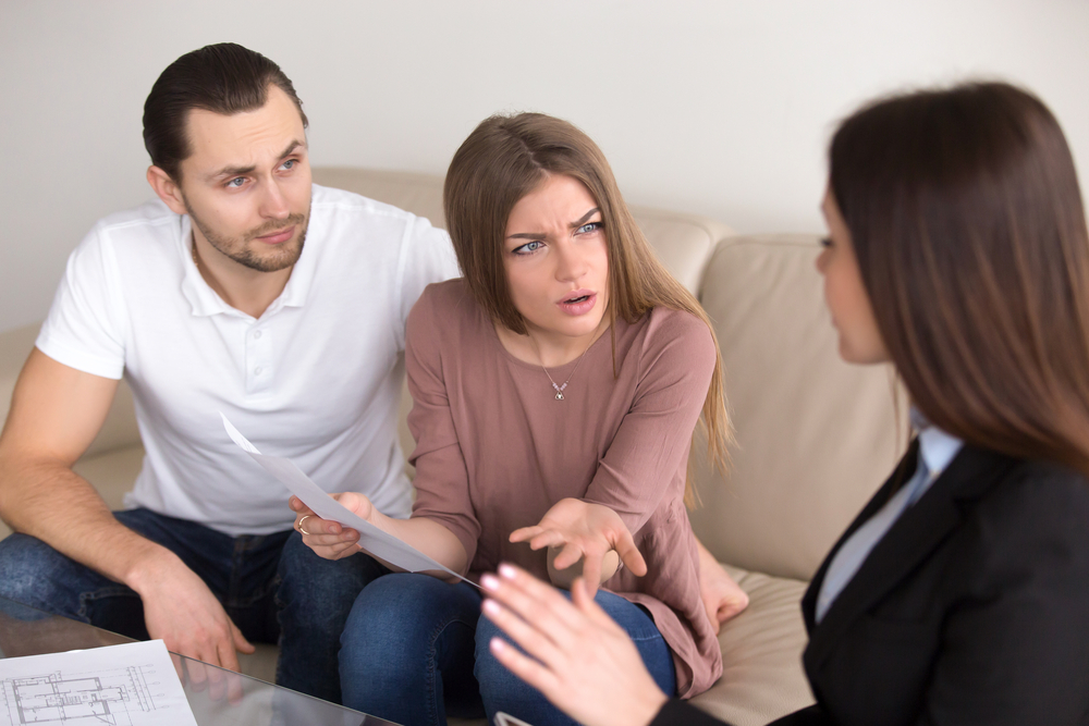 couple annoyed with real estate agent