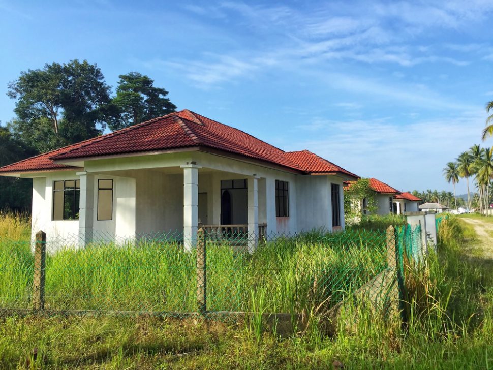 Unfinish project or abandoned house with sunrise and blue sky